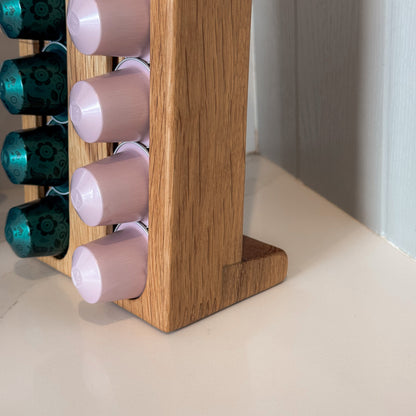 This image shows the detail of the oak coffee pod stand at it's base