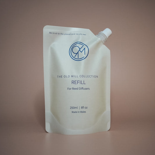 beige recyclable plastic pouch reading the old mill collection refill for reed diffusers
