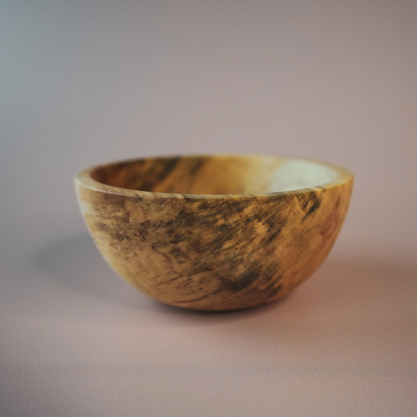 oiled wooden bowl made from sycamore wood with natural spalted detail
